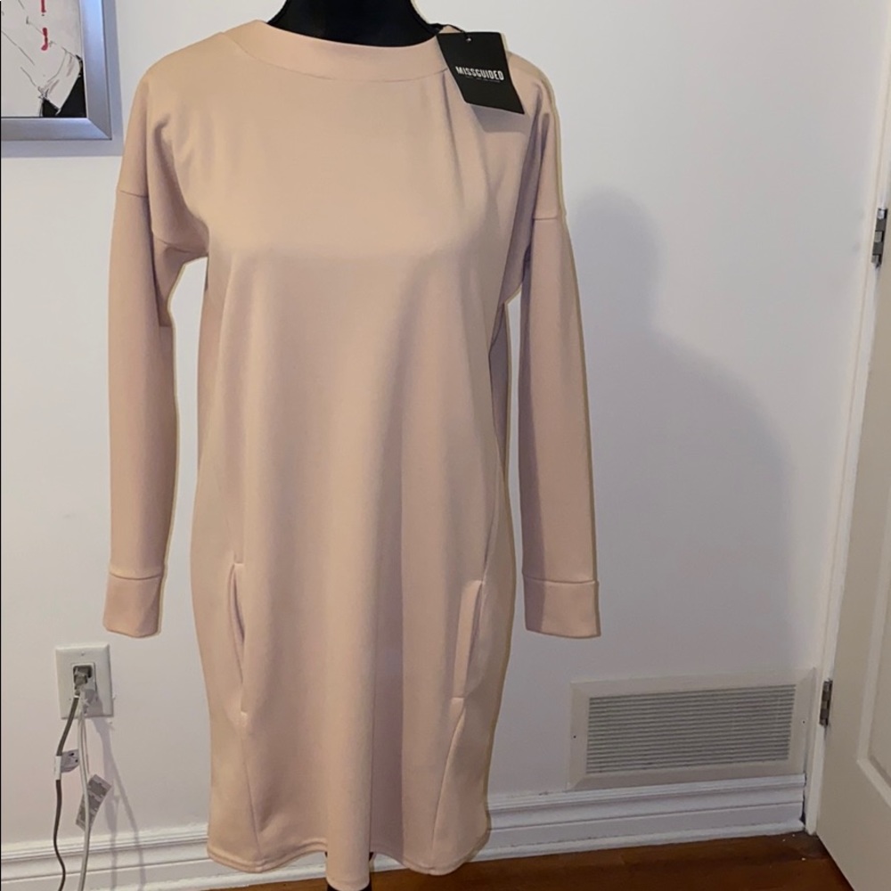 Dress with tagg